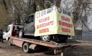 За долги по налогам у алматинцев конфискуют автомашины 