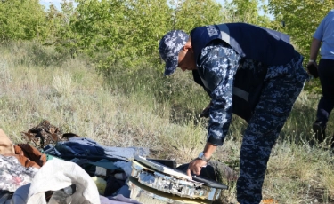 Павлодарда қоқыс арасынан Қазақстан елтаңбасы табылды