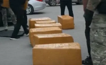 Астанада екі ер адамнан 270 келіден астам есірткі мен тапанша тәркіленді