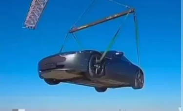 Авантюра или безумие: зачем шымкентец поднял машину на крышу 12-этажного дома