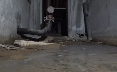 Желге ұшқан ақша: Іле ауданындағы білім ордасының жертөлесі суға толып қалды