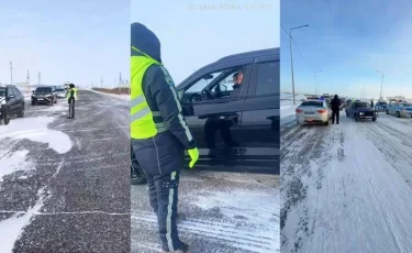 Буран в СКО: полицейские помогли сотням водителям выбраться из снежного плена на автотрассах