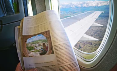 Әуеде насихатталған қала: Алматы туралы енді Asman Airlines ұшағында да оқуға болады