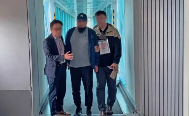 Терроризмге күдікті Қазақстан азаматтары ҰҚК арнайы жасағының күзетімен елге оралды