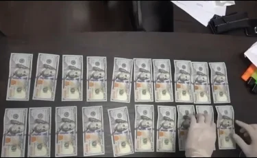 Взяли с поличным: директора предприятия подозревают в попытке подкупа следователя
