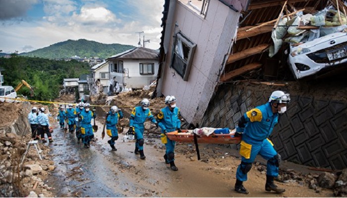 Число жертв от наводнения в Японии растет  