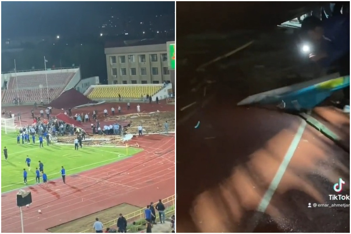 Рискуя жизнью: болельщики "спасли" флаг Казахстана, оказавшийся под завалами на стадионе 